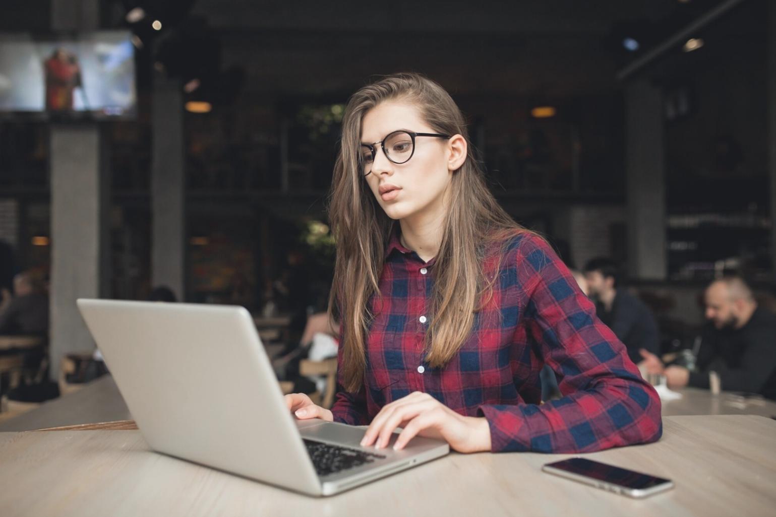 User testing session with mobile app prototype on multiple devices
